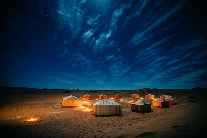 Tent in the desert at night, Starlink Mini desert camping in the UAE