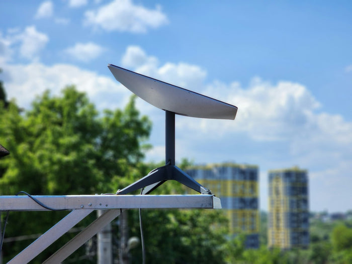 Starlink terminal mounted on a pole for business internet
