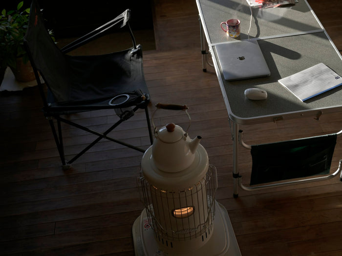Outdoor camp table with a laptop set up for working off-grid