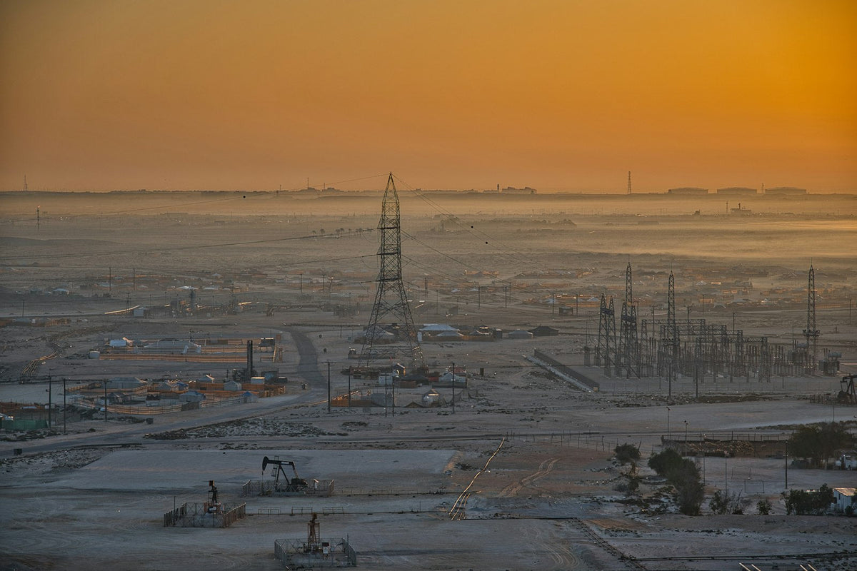 Oil field pumpjacks in the desert at sunrise, Starlink for remote sites and camps in the UAE